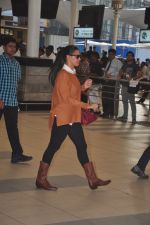Neha Dhupia snapped at airport in Mumbai on 20th Dec 2014